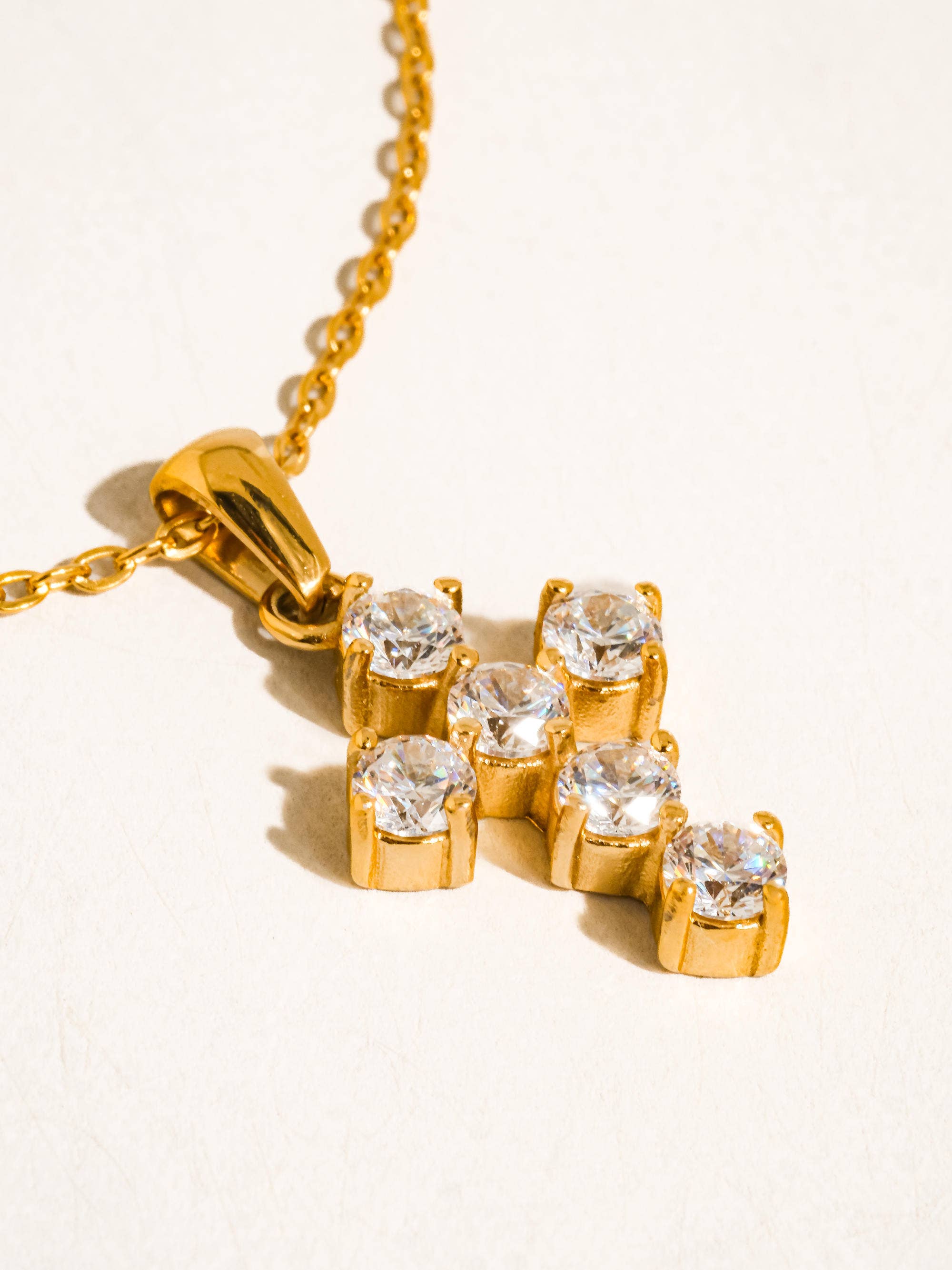 Raimon  Cross Necklace: Yellow Gold